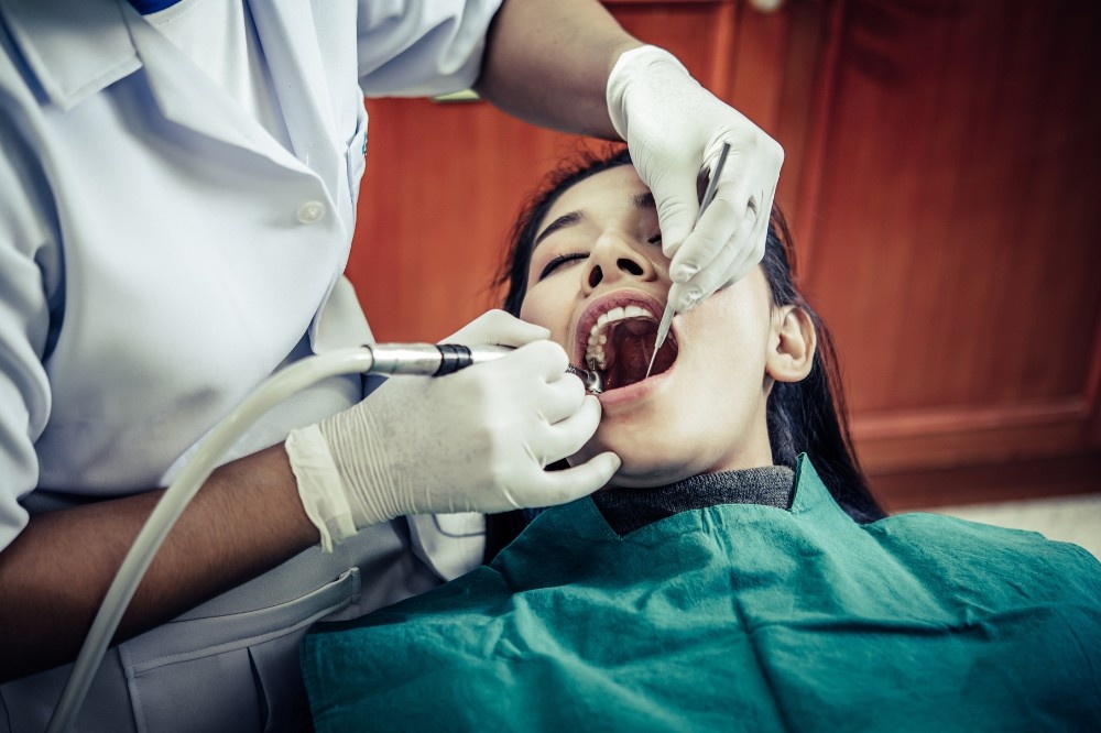 can periodontal treatment reduce bad breath and gum infections